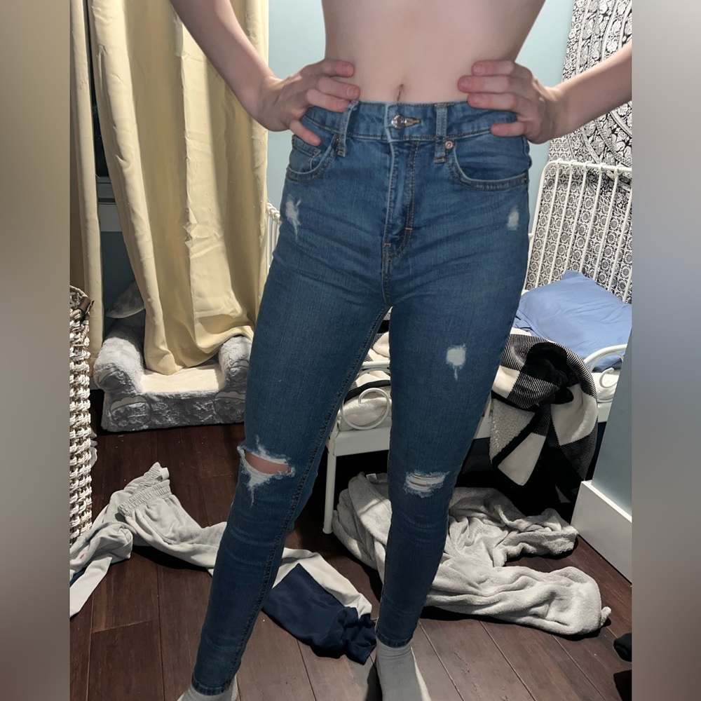 Blue skinny jeans with rips like new condition size 2